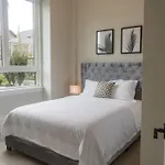 Modern Ground Level 3 Bed 2 Bath Condo With Free Parking